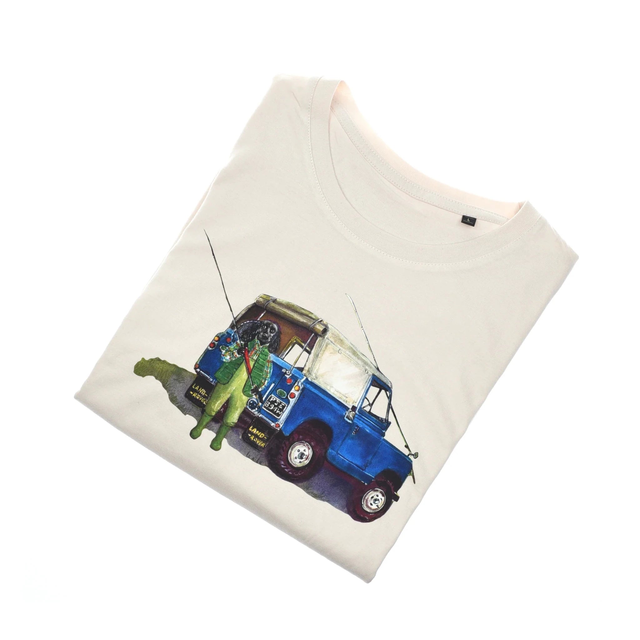 The Campbell's of Beauly Auld Stock Land Rover Cocker T-Shirt is a folded white tee featuring a blue vintage Land Rover and an angler—ideal for country adventures.
