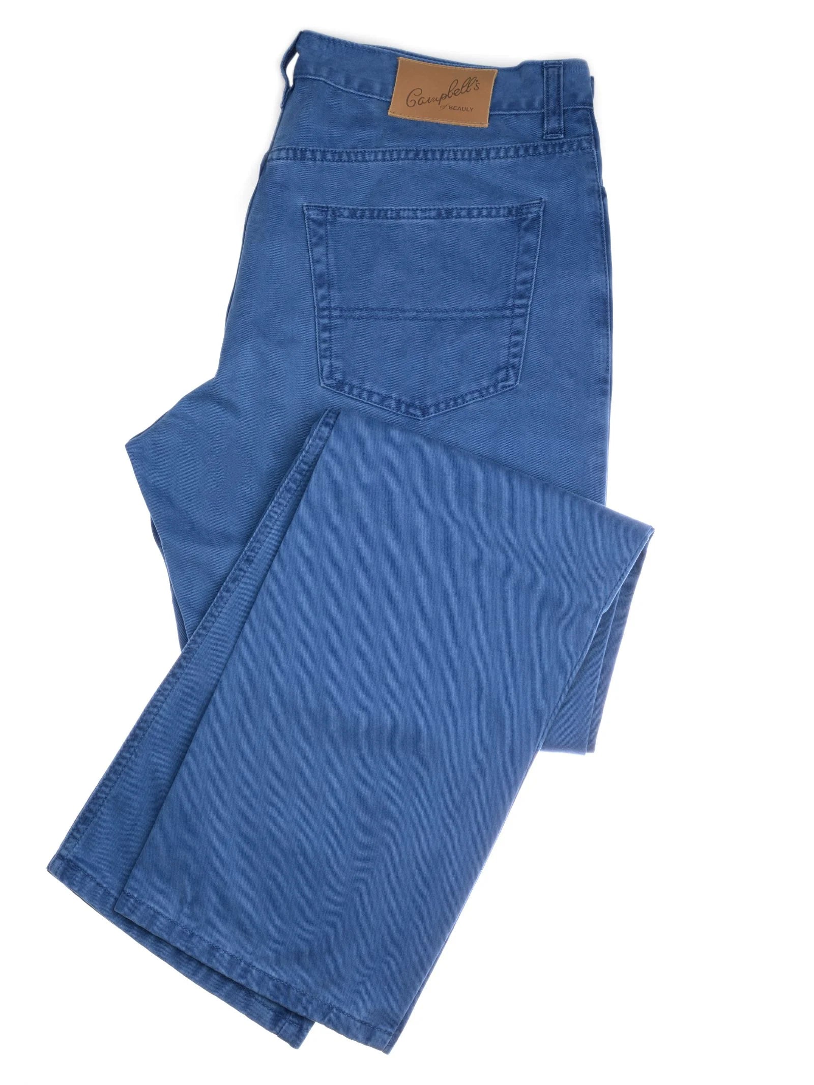 A pair of Campbell's of Beauly Colour Cotton Jeans in Yale Blue, straight leg cut with a visible back pocket and brown leather patch on the waistband, are neatly folded and displayed on a white background.
