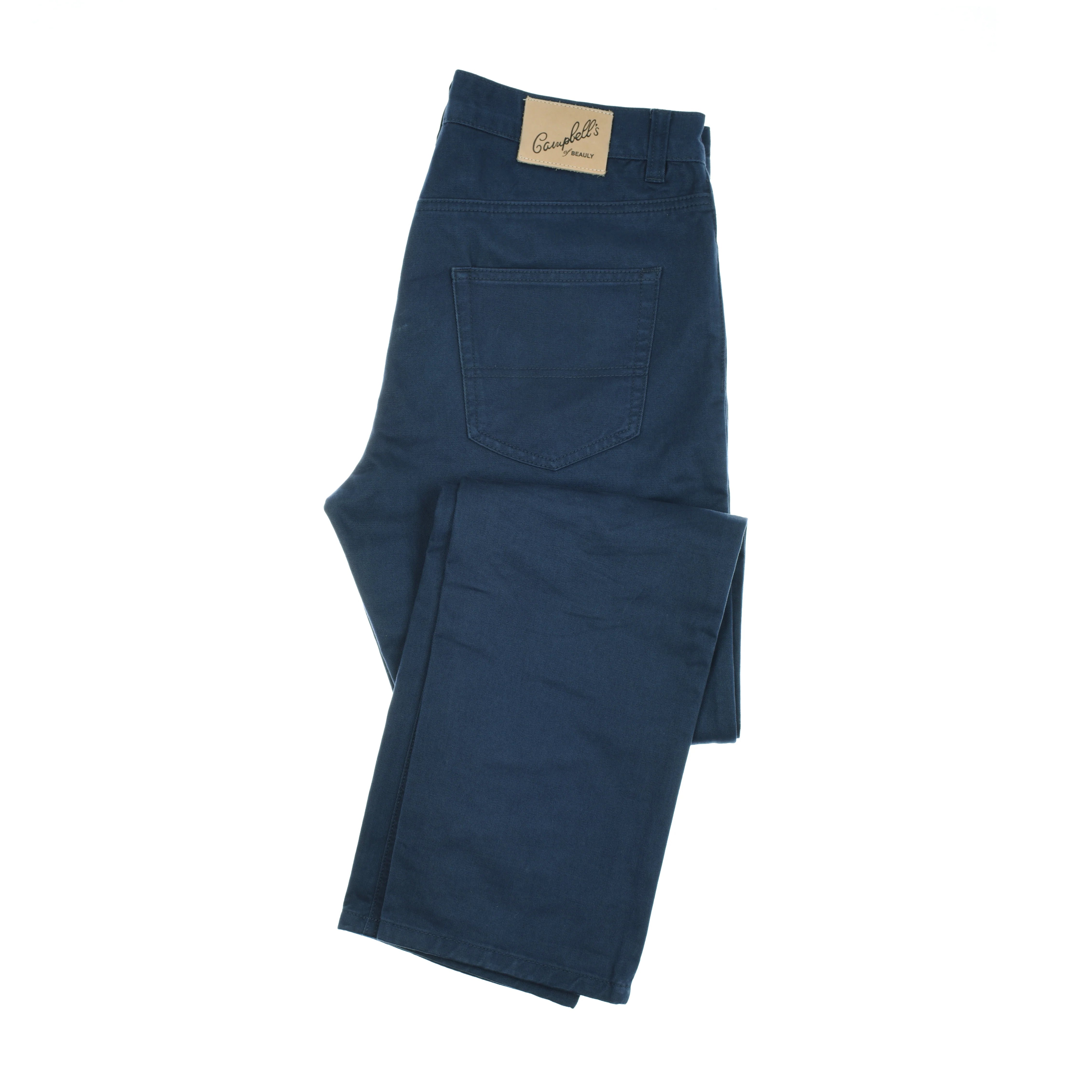 A pair of Campbell's of Beauly Colour Cotton Jeans in Midnight, featuring a five-pocket design and a brown leather patch on the waistband, folded on a white background.