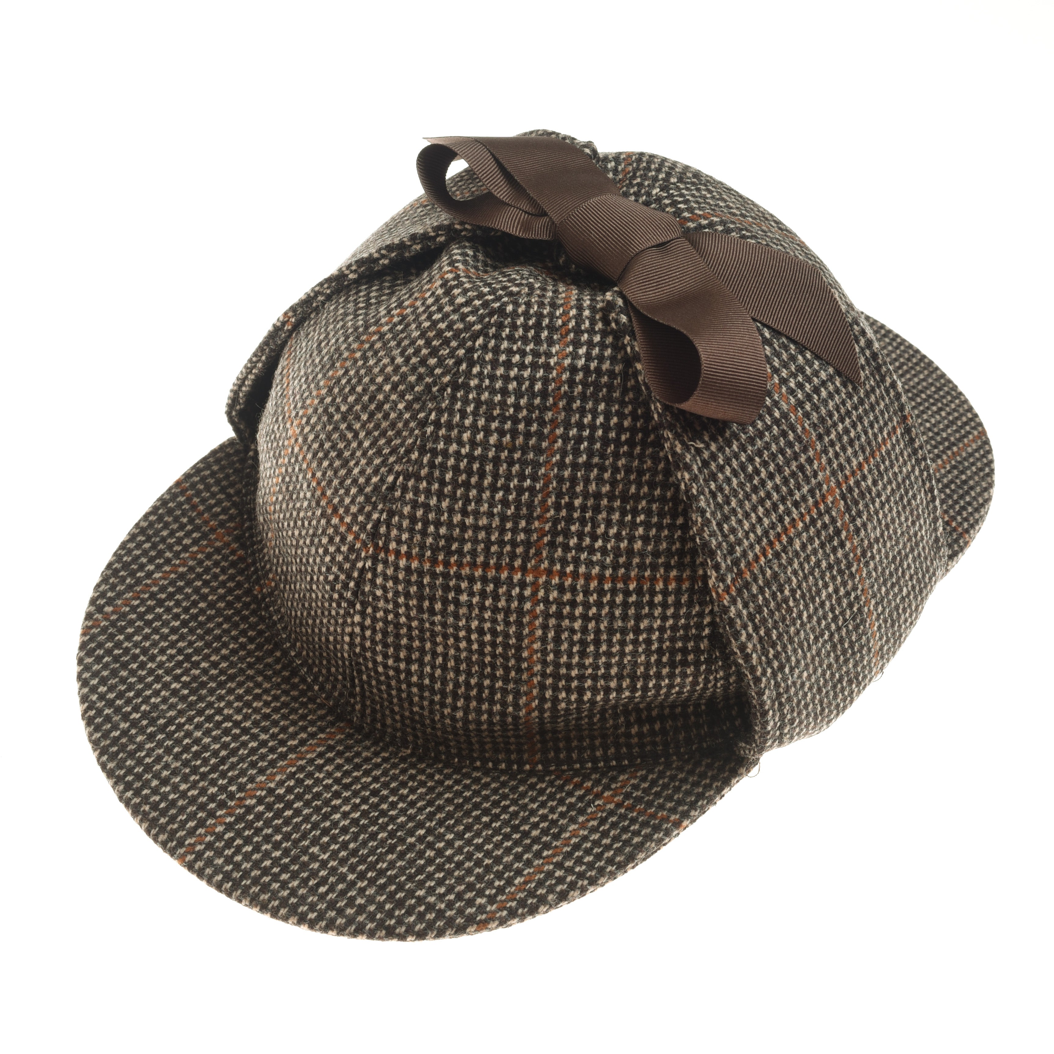 A Campbells of Beauly Sherlock Holmes Hat, featuring brown and beige plaid with ear flaps and a brown ribbon bow, is shown against a white background.