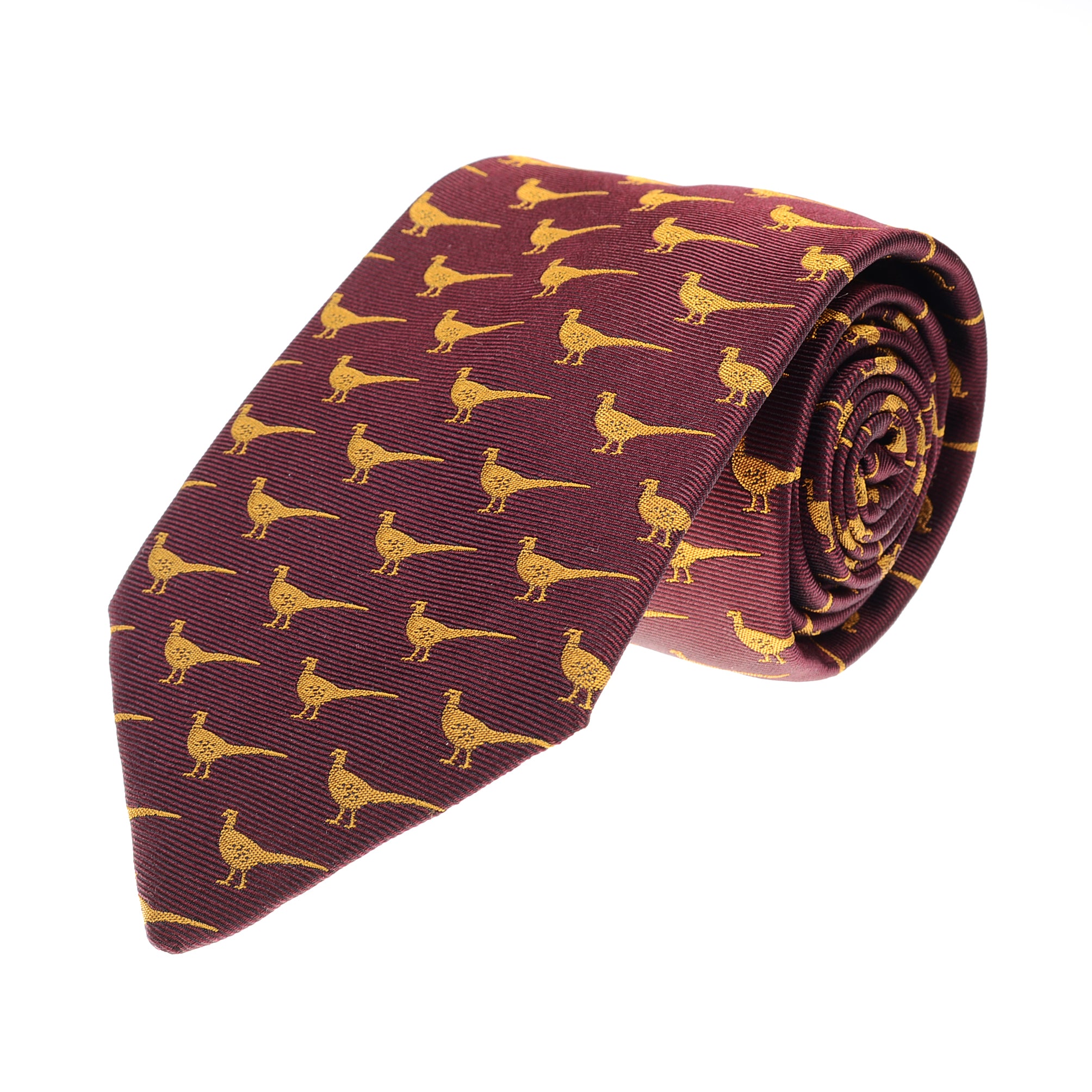 The Pheasant Silk Tie by Campbells of Beauly is a handmade maroon silk tie featuring repeating yellow pheasants facing left, with a smooth, shiny finish and charming countryside motifs across the front and rolled section.