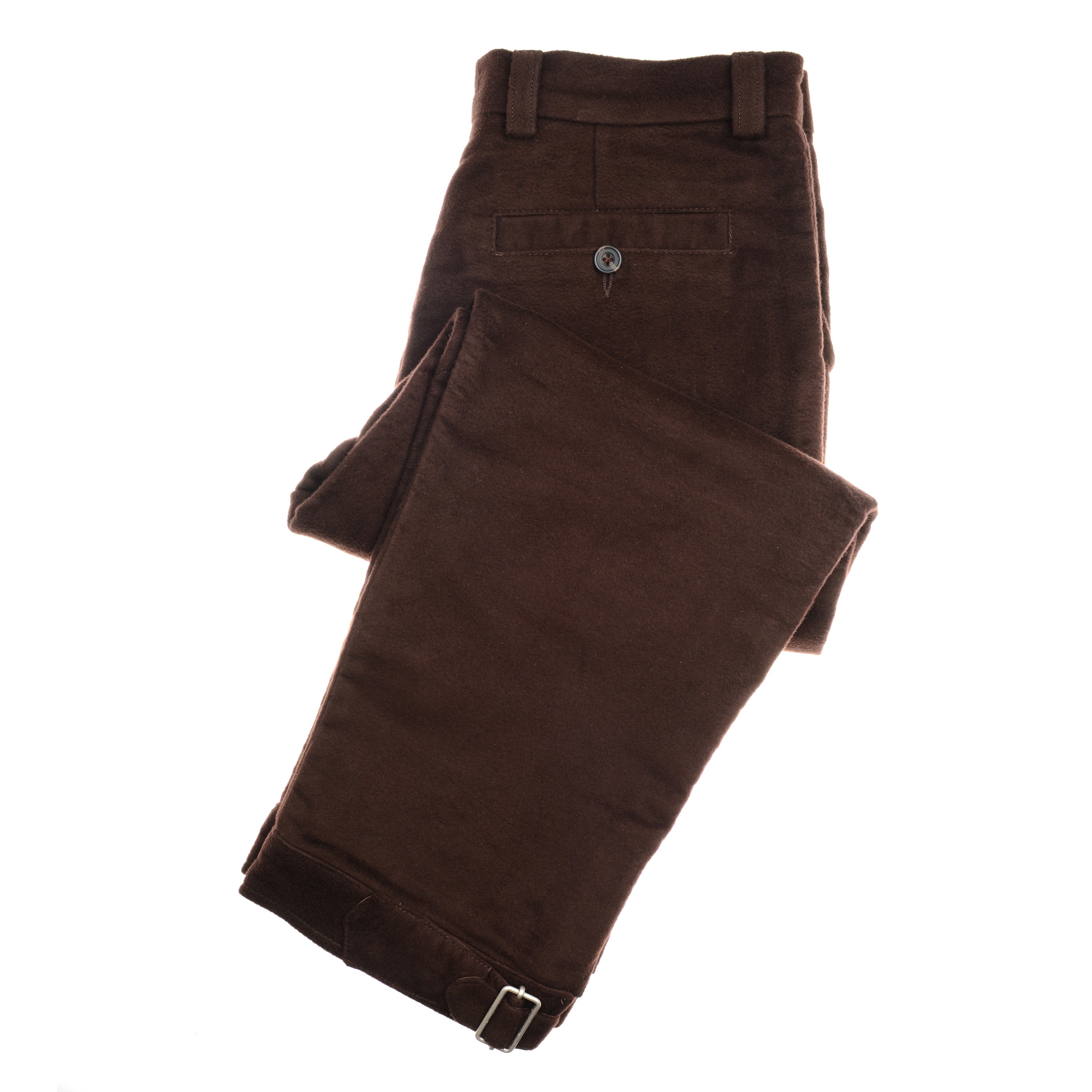 The image shows Campbell’s of Beauly Moleskin Plus Twos—neatly folded dark brown trousers with soft, textured fabric, a back button pocket, and a slim belt buckle detail on one leg—all set against a white background.