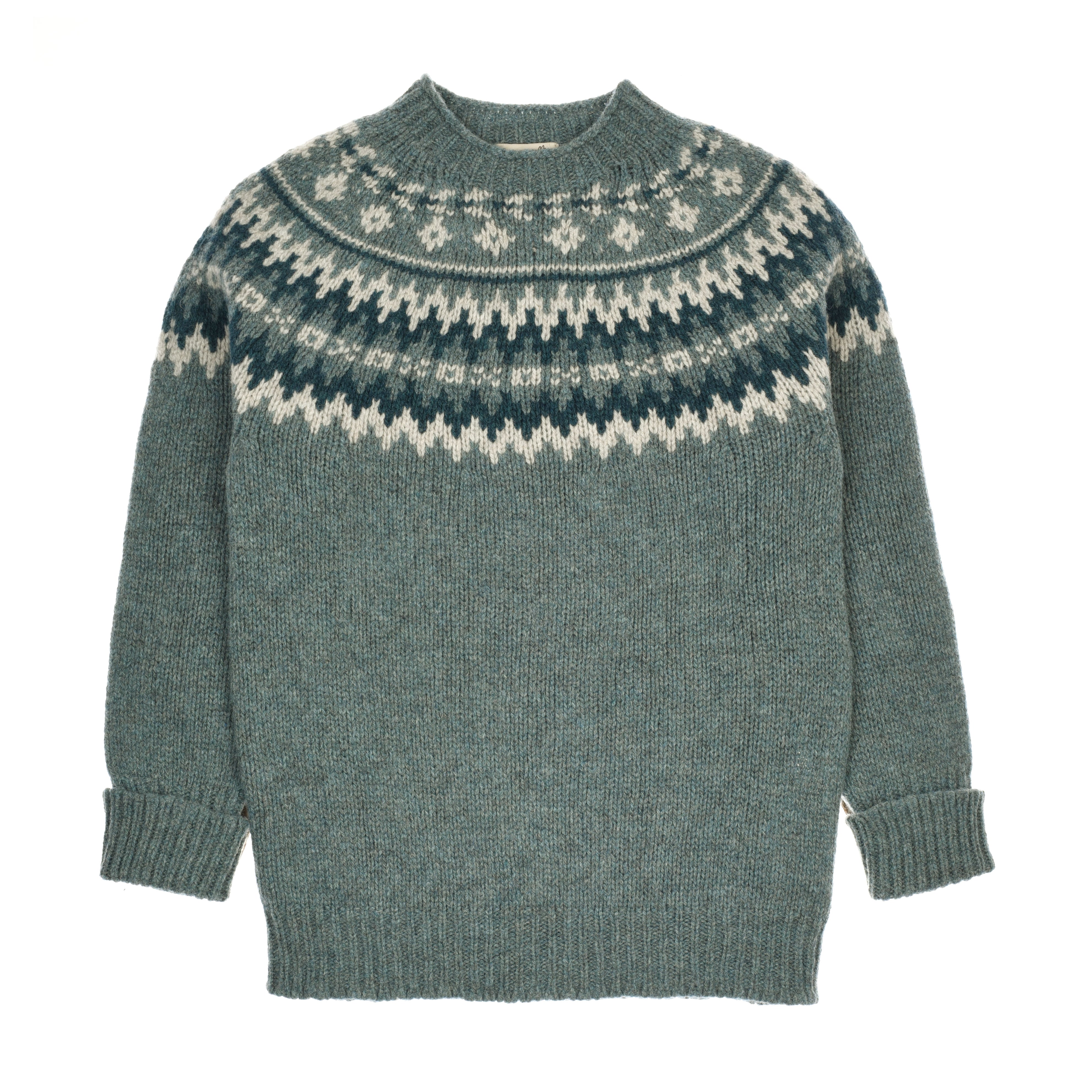 The Chunky Fairisle Jumper by Campbells of Beauly features a teal body with long sleeves, a round neck, and a Nordic-inspired yoke in white and dark green. Made from Shetland wool with ribbed cuffs and hem for warmth, shown laid flat on a white background.