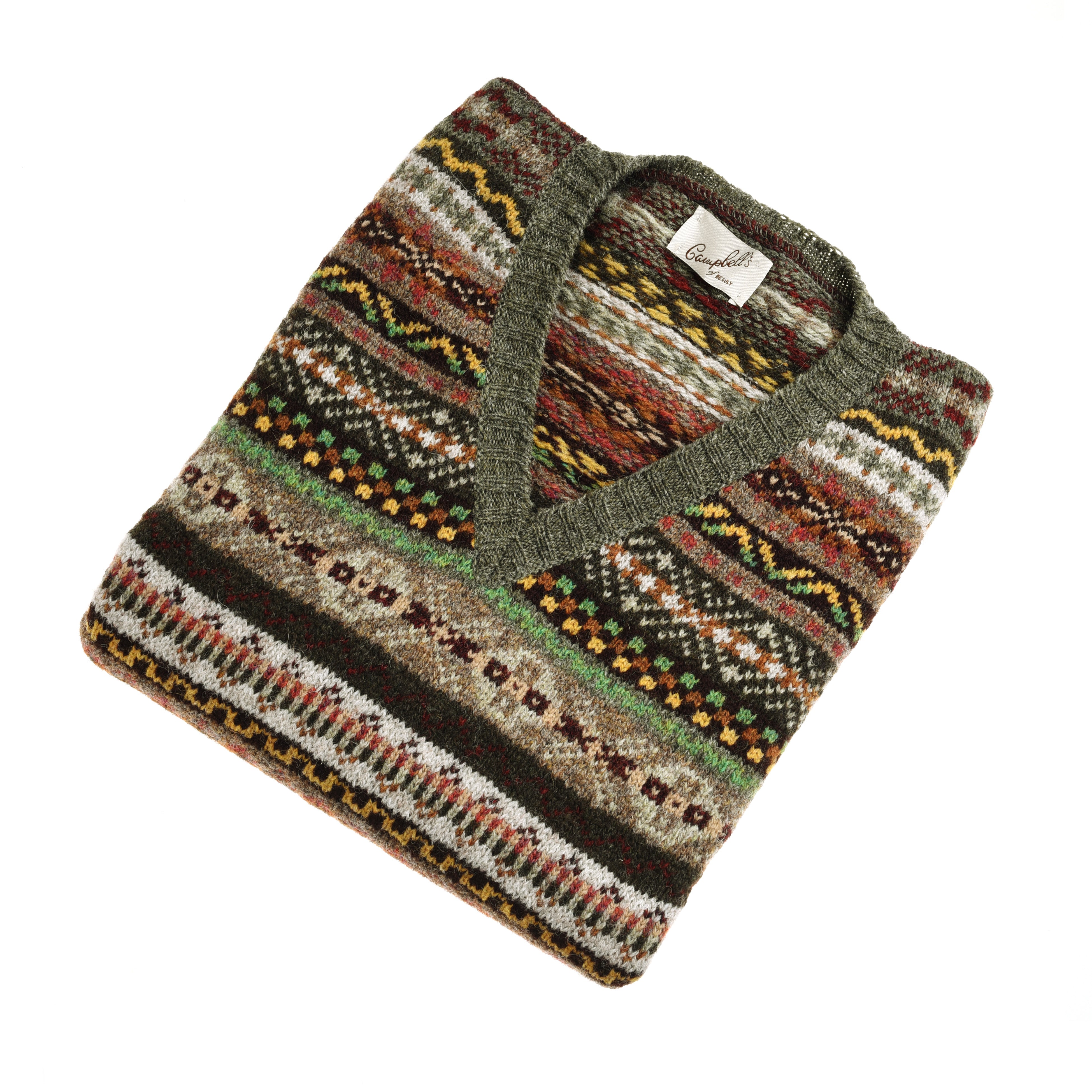 The Fairisle Slipover by Campbells of Beauly is a sleeveless V-neck knit in soft Shetland wool, featuring a multicolored geometric Fairisle pattern in green, brown, red, yellow, and cream with a label at the neckline.