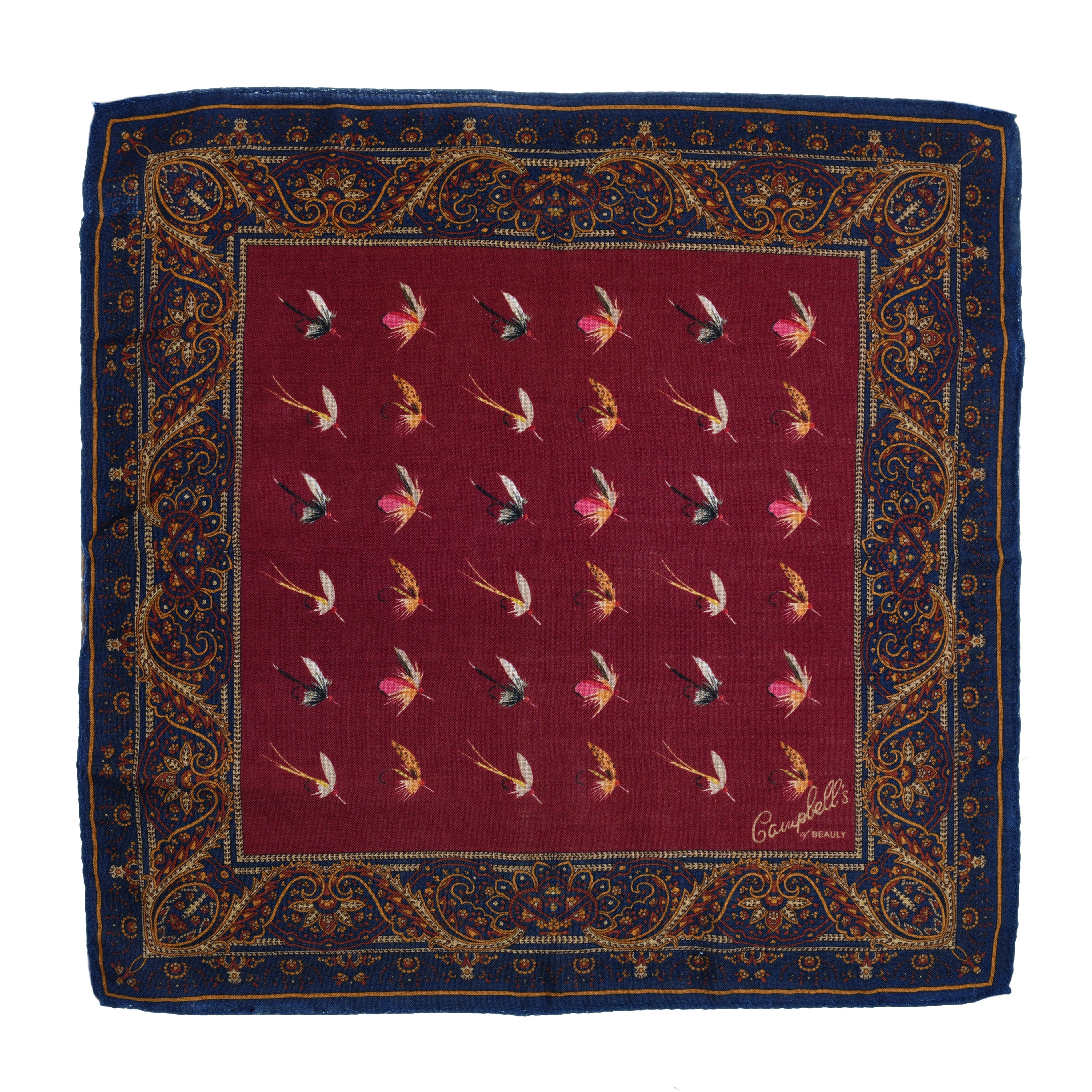 A square wool & silk hank by Campbells of Beauly, featuring a red center with flying birds in rows, a navy border with gold paisley and floral designs, hand-rolled edges, and Campbells of Beauly signature in the corner.