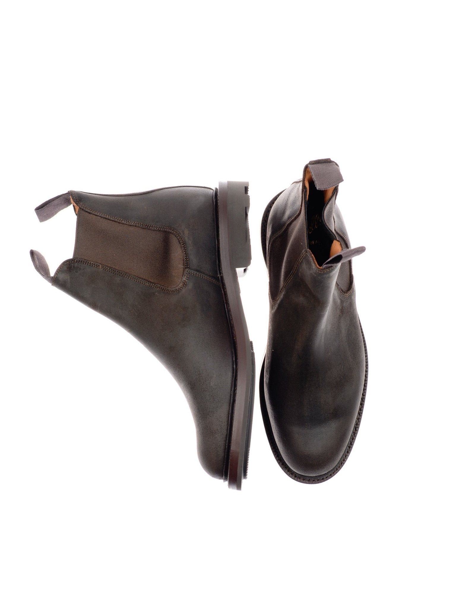 The Campbell's of Beauly Lowlander Boots, handmade in England from dark brown leather with elastic side panels and pull tabs, are shown against a white background—one displayed side-on, the other viewed from above.