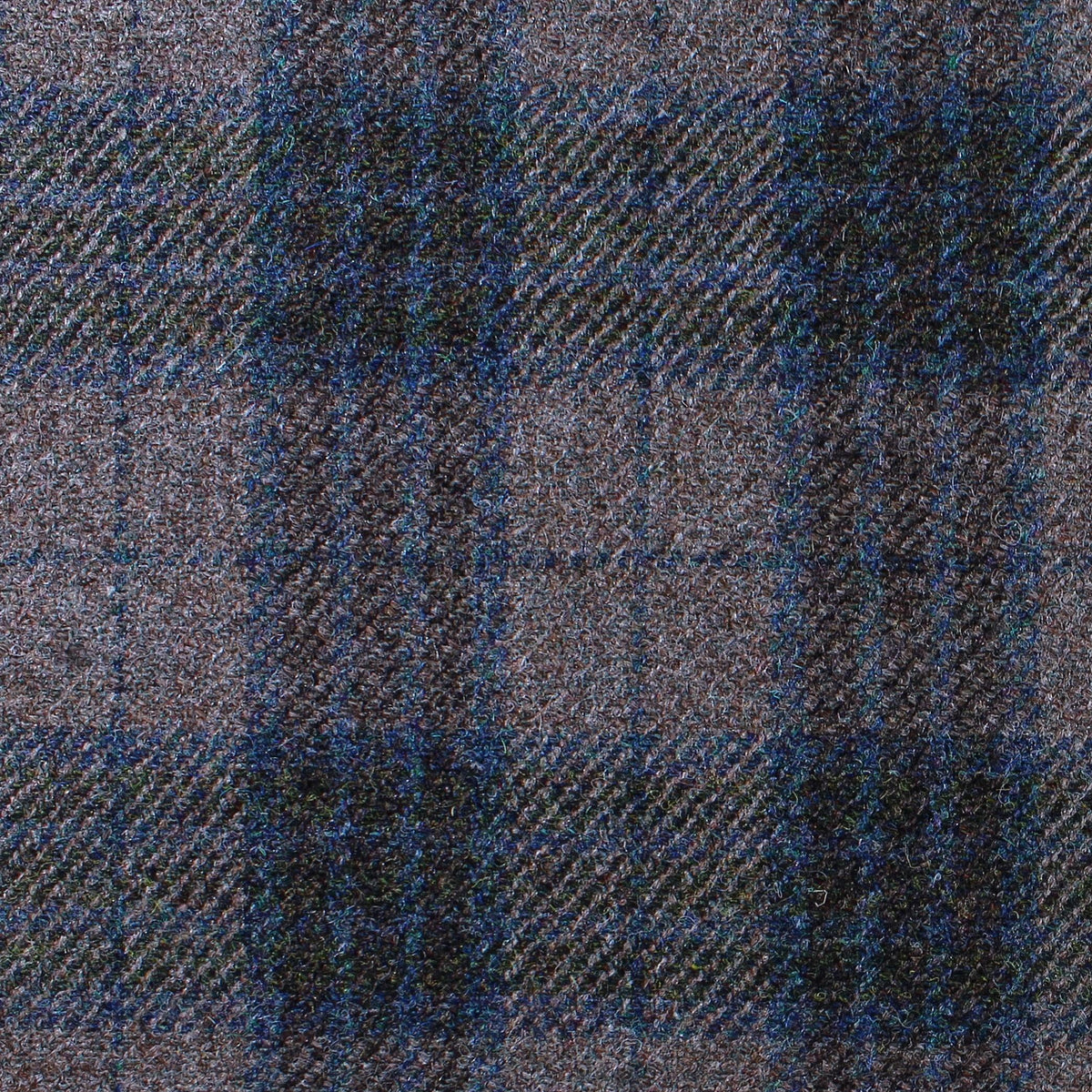 Estate Tweed 035 heavyweight sporting tweed fabric in a brown, blue, and black plaid pattern.