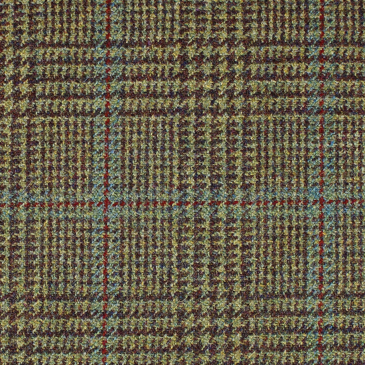 Estate Tweed 044 heavyweight wool fabric in green and brown, featuring a traditional estate tweed checkered pattern with thin red and blue overcheck lines.