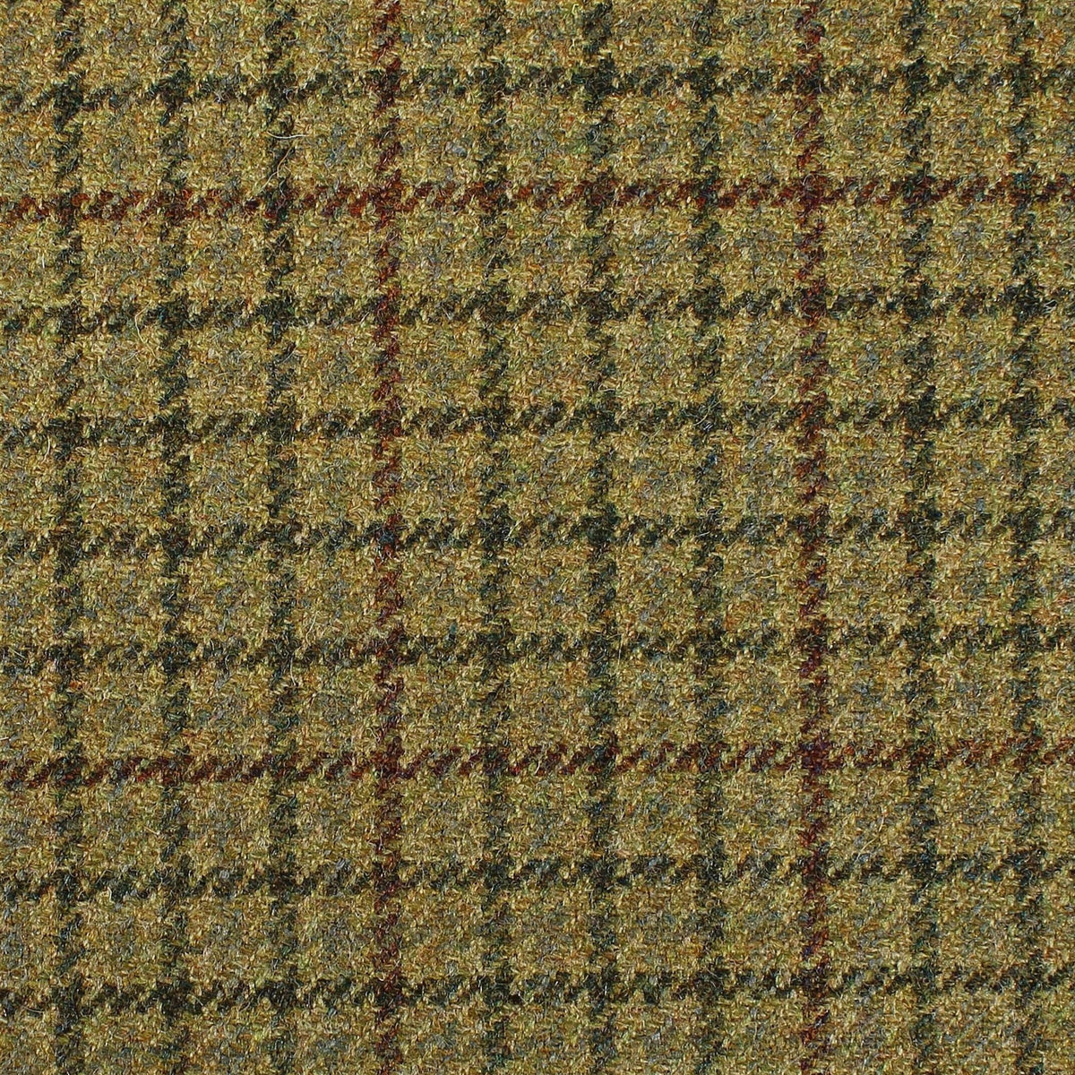 Estate Tweed 063 olive green heavyweight wool tweed fabric featuring a brown and dark green windowpane plaid pattern in a traditional sporting cloth.