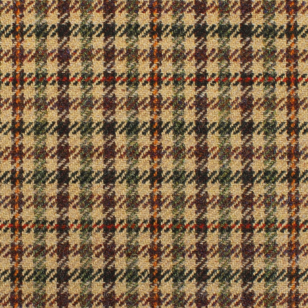 Estate Tweed 071 is a heavyweight estate tweed fabric featuring a brown, tan, and dark green houndstooth pattern overlaid with a thin orange and red windowpane check.