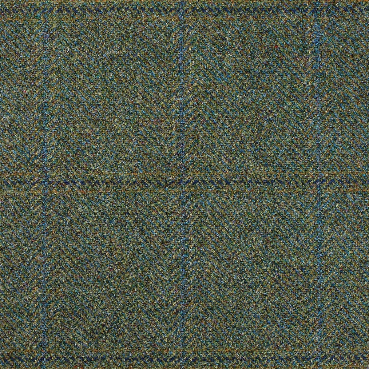Estate Tweed 076 heavyweight estate tweed in green wool featuring a multicolored herringbone weave and a large blue windowpane check pattern.