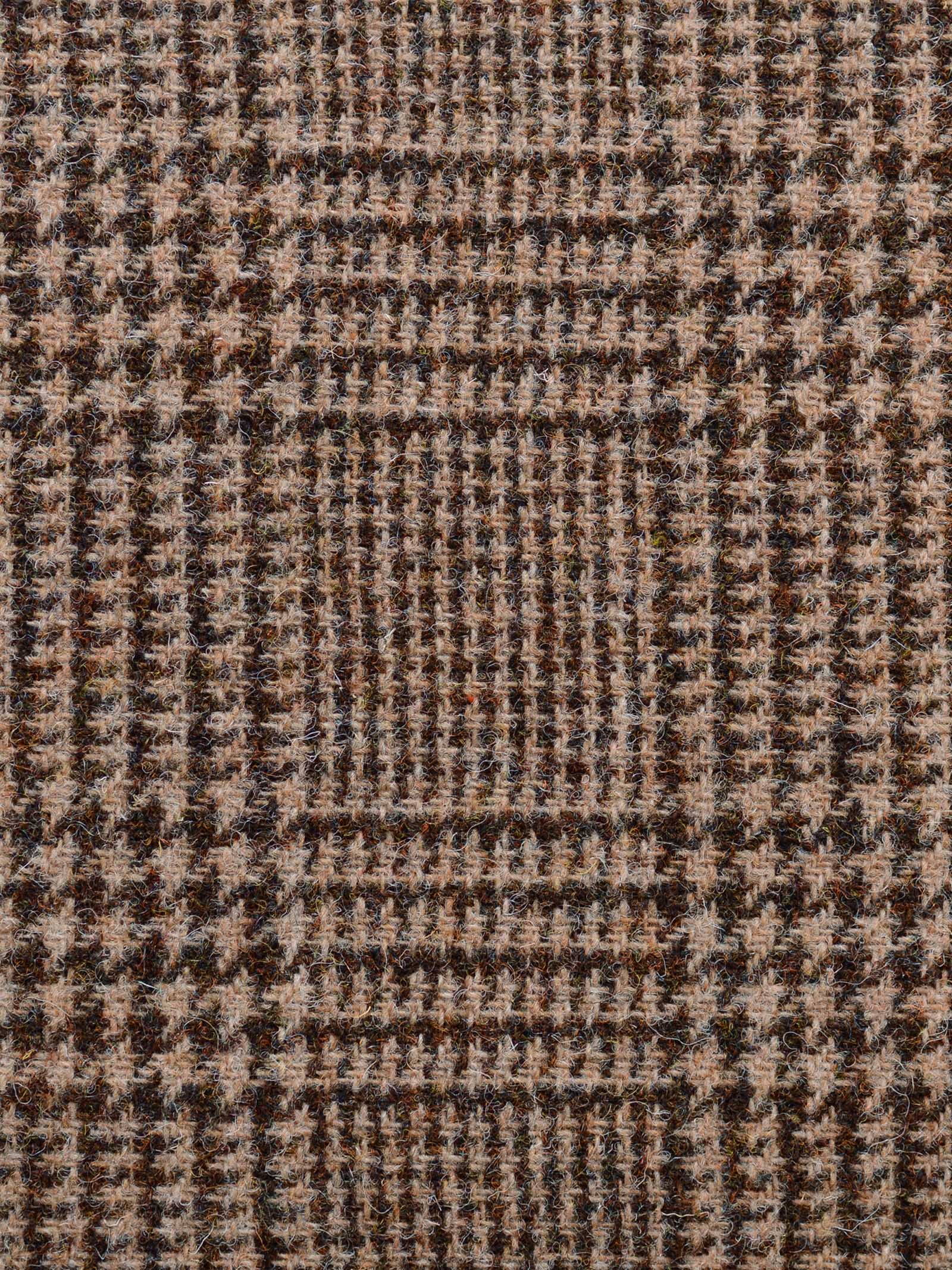 Close-up of Harris Tweed 79336 by Campbell's of Beauly, showcasing a brown and beige houndstooth pattern with intersecting lines and textured fibers, echoing classic tailoring and traditional Scottish design.