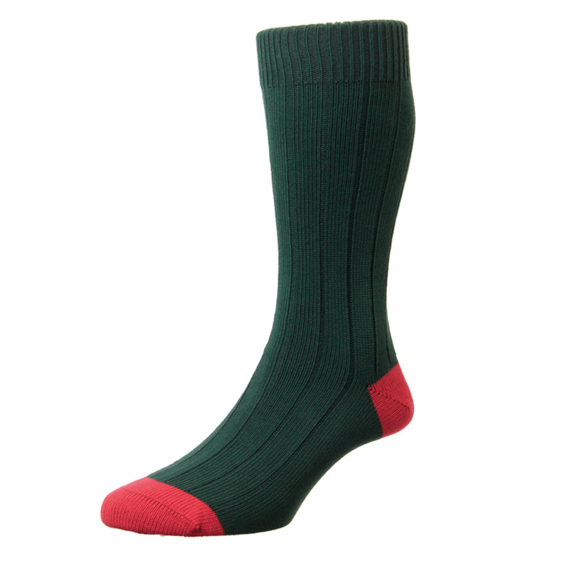 A single Campbells of Beauly Oxford Sock stands upright on a plain white background. Made in the UK, it features dark green ribbing with a thick cuff and fitted foot, plus contrasting red heel, toe, and sole.