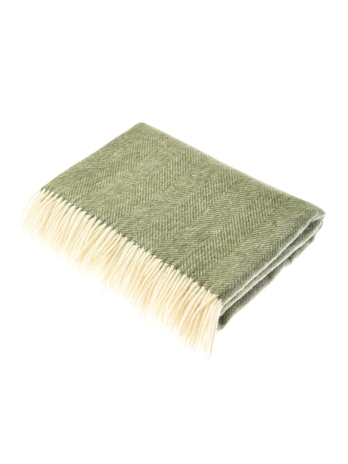 The Campbell’s of Beauly British Wool Throw Green, featuring a herringbone pattern and cream-colored fringed edges, is shown folded on a white background and beautifully woven in Scotland.