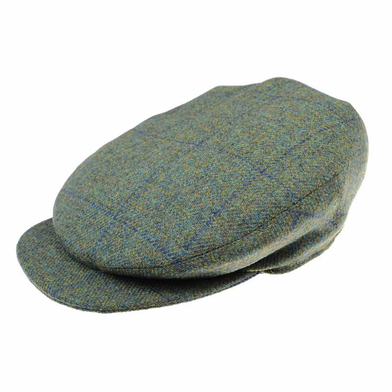 The Green Beauly Cap by Campbell's of Beauly in Kirkton 572 features a classic British tweed design with a short, rounded brim—ideal for fans of traditional headwear.