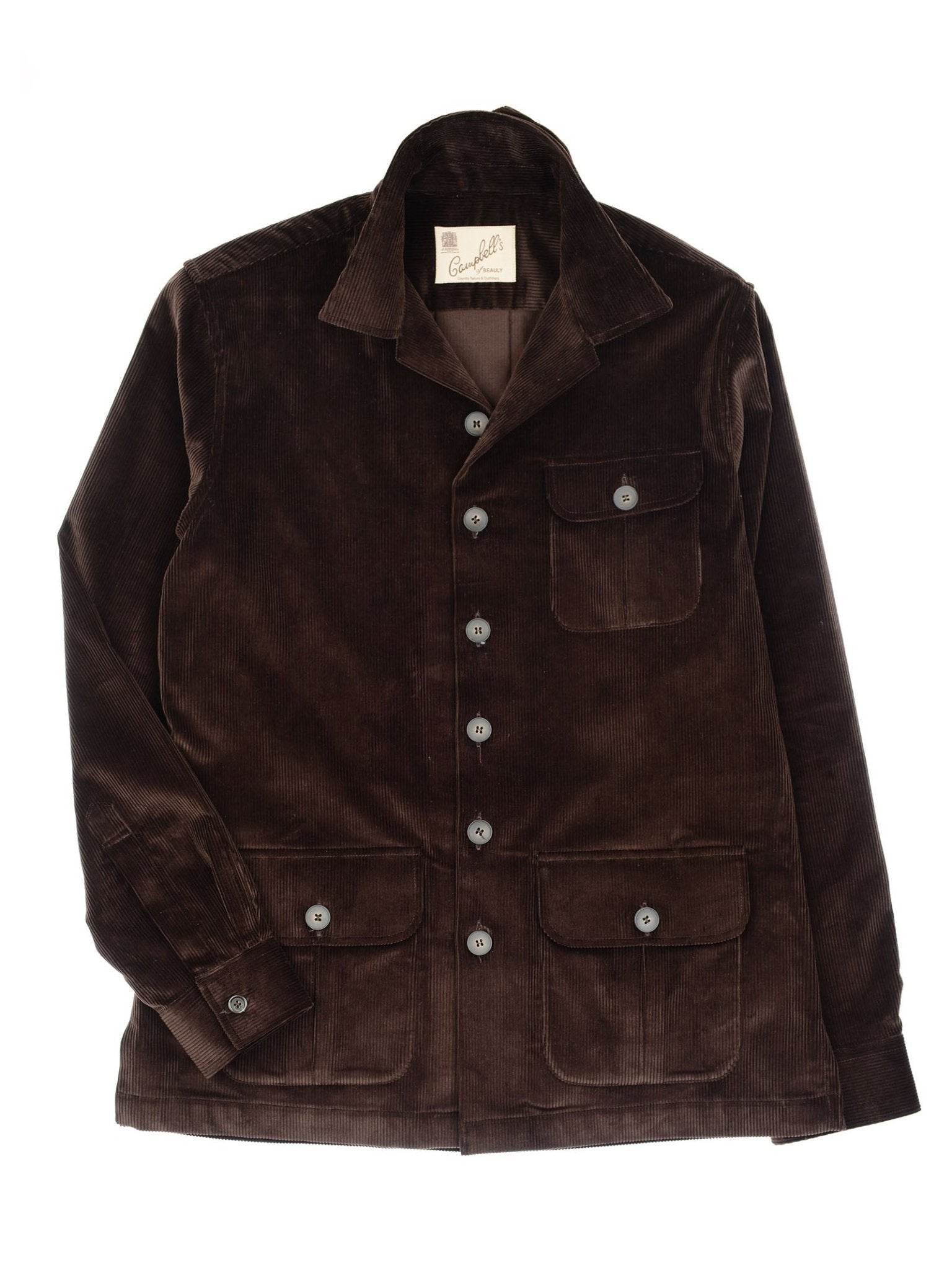 A Campbell’s of Beauly Casual Shacket in brown corduroy, featuring a collar, three front pockets, and button closures, is displayed flat on a white background.