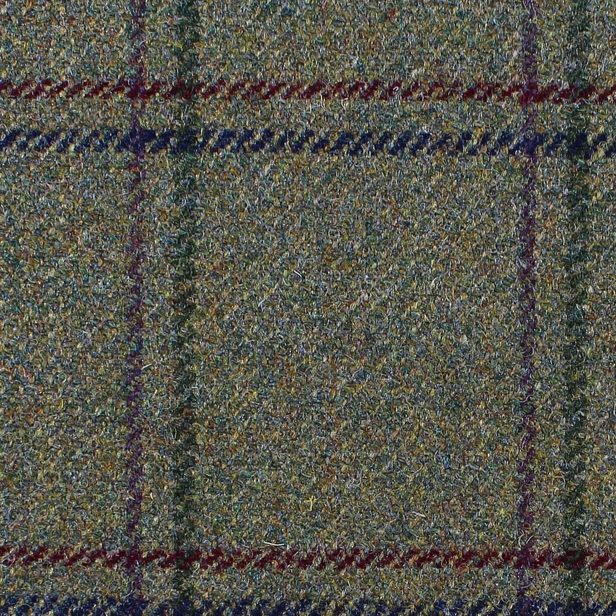 Estate Tweed 009 in a heavyweight olive green with a subtle plaid pattern of thin, dark purple and blue intersecting lines.