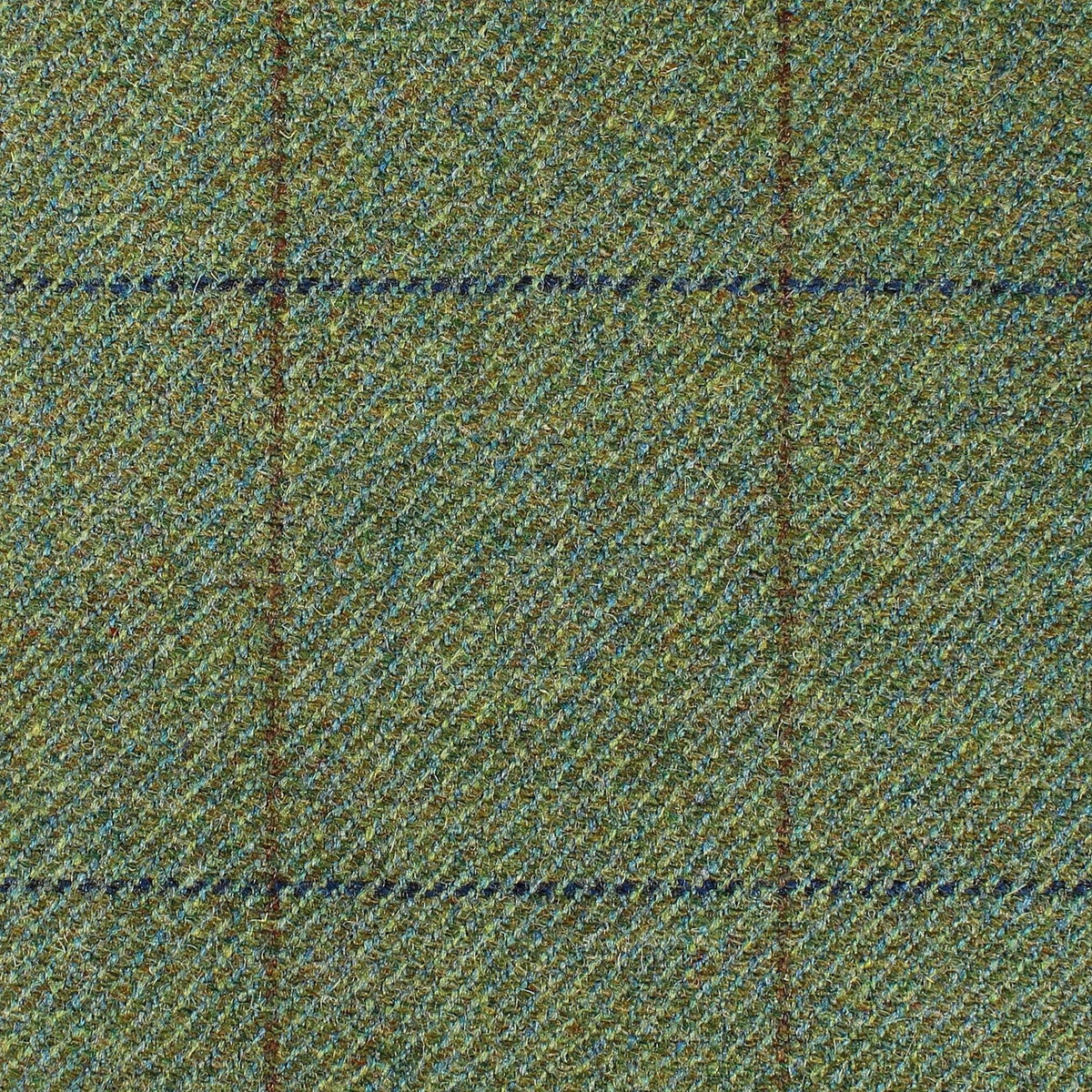 Estate Tweed 021 heavyweight green herringbone tweed fabric with a subtle dark brown and blue windowpane check pattern.