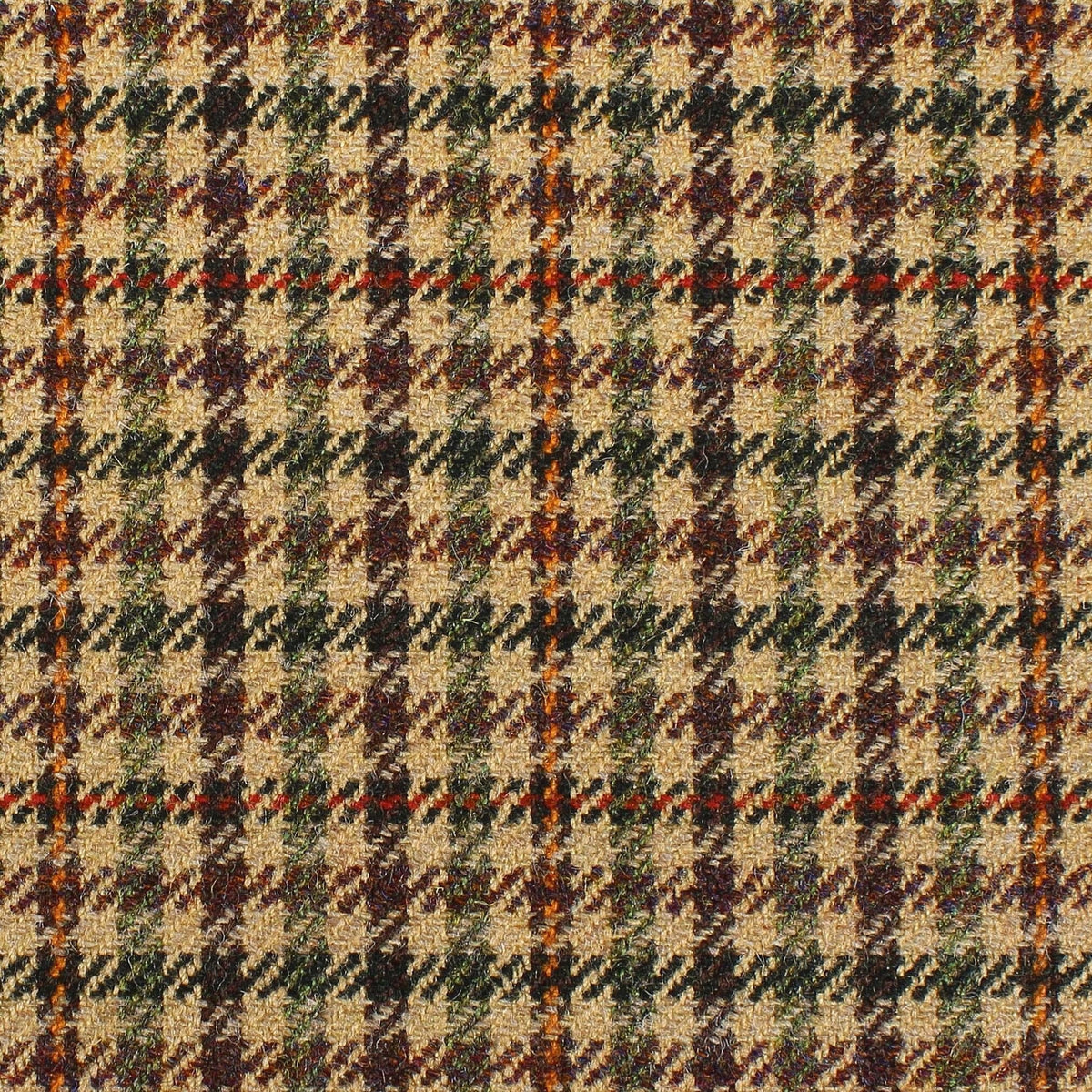 Estate Tweed 025 is a heavyweight tan tweed fabric with a multi-colored houndstooth and windowpane check pattern in shades of brown, green, and orange.