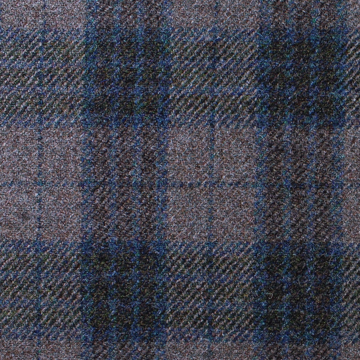 Estate Tweed 035 heavyweight sporting tweed fabric in a brown, blue, and black plaid pattern.