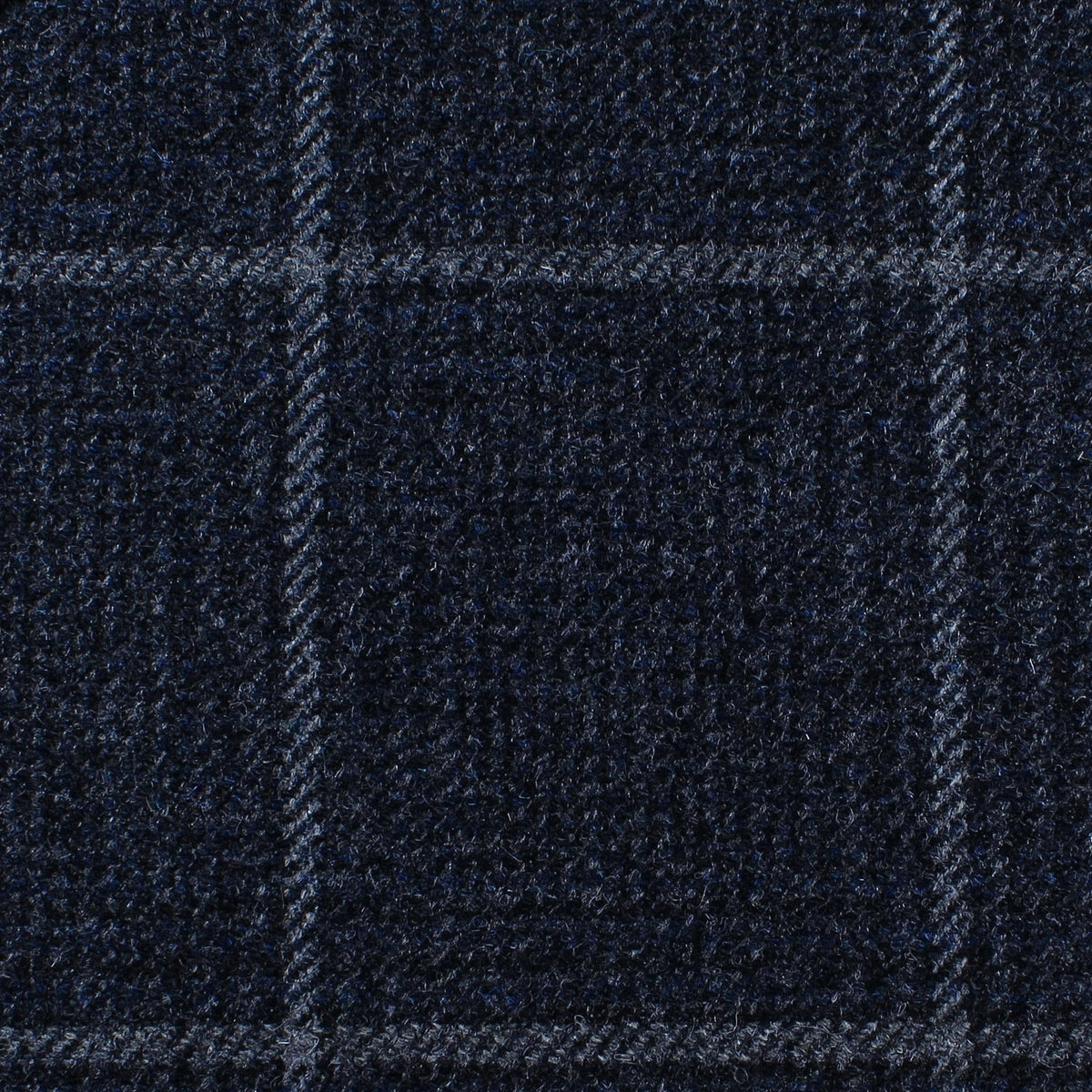 Estate Tweed 036 dark navy blue estate weight tweed featuring a faint windowpane check pattern.