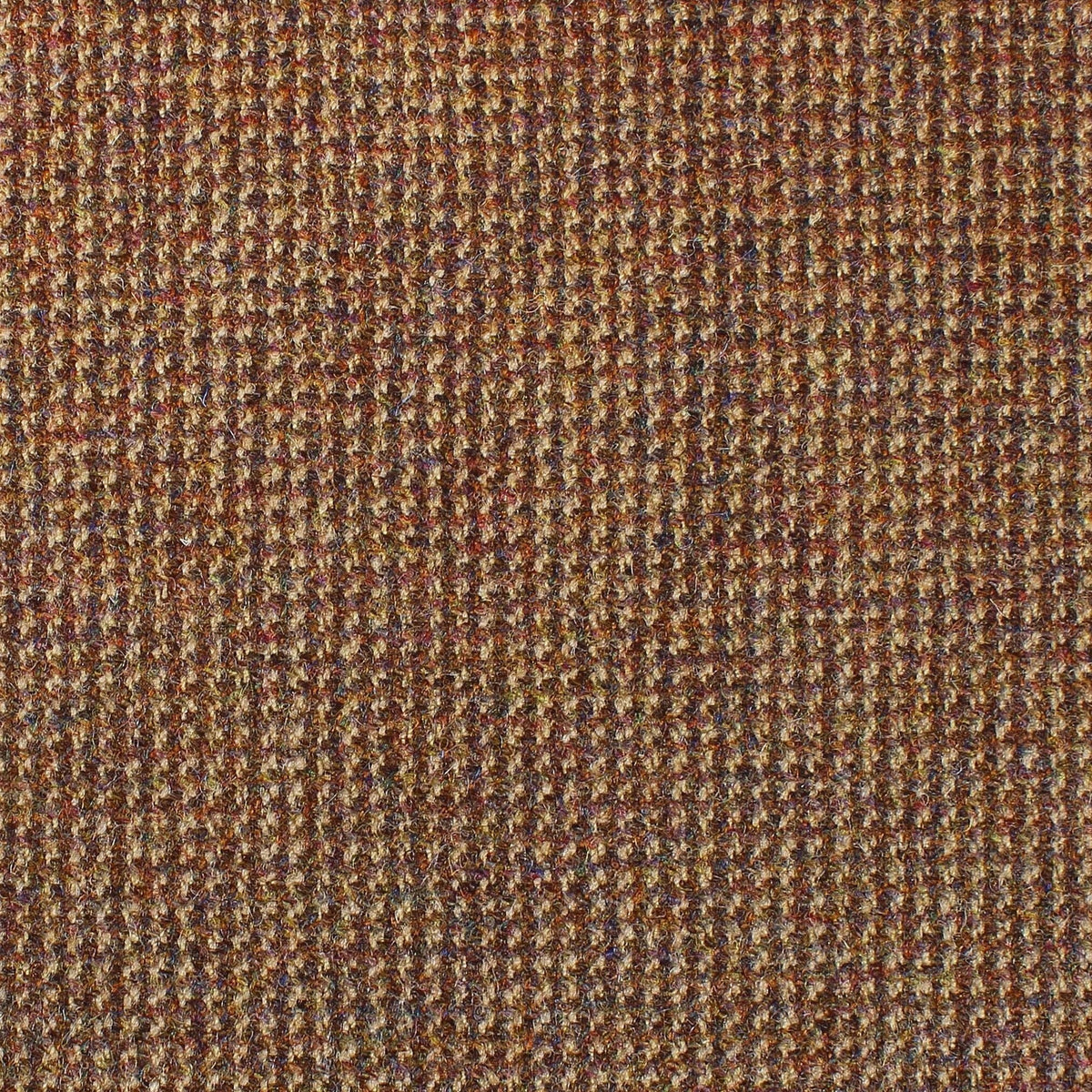 Close-up of Estate Tweed 039, a brown, gold, and red estate weight tweed with a small, uniform weave pattern.