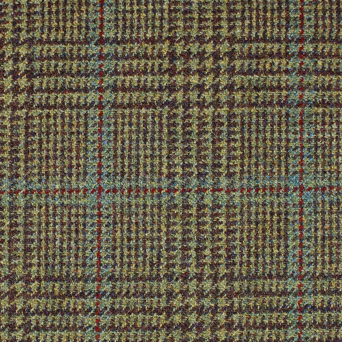 Estate Tweed 044 heavyweight wool fabric in green and brown, featuring a traditional estate tweed checkered pattern with thin red and blue overcheck lines.