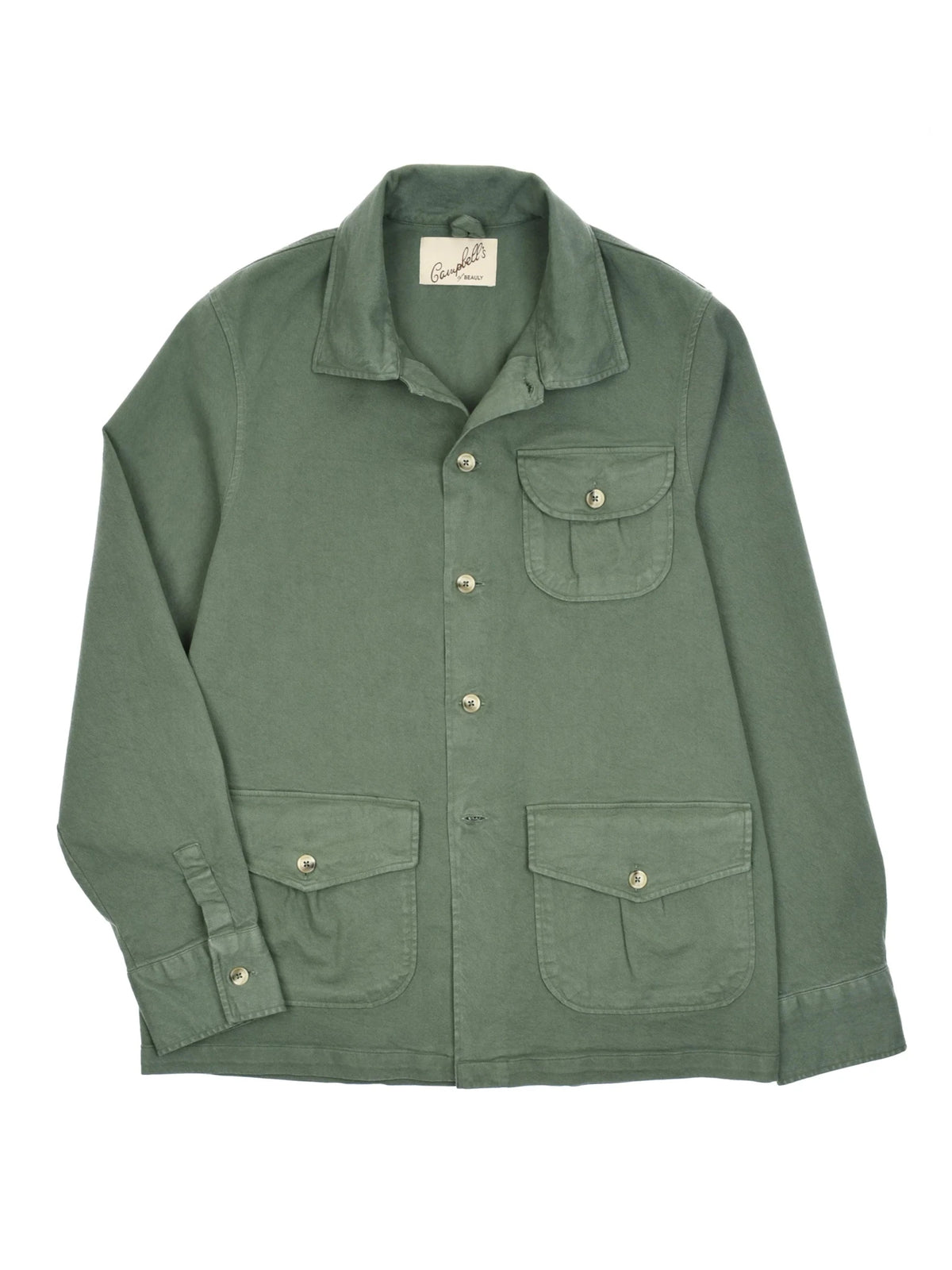The Campbell’s of Beauly Field Chore Jacket is a green, 100% cotton button-up with a collar, long sleeves, and four front pockets—three with flaps and buttons. Made in Europe and shown laid flat on white.