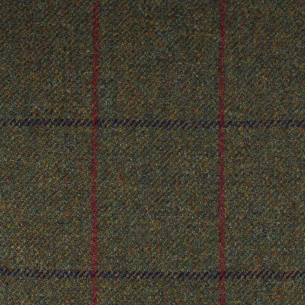 Field Tweed 098 olive green Scottish tweed fabric with a subtle dark blue and red windowpane check pattern.