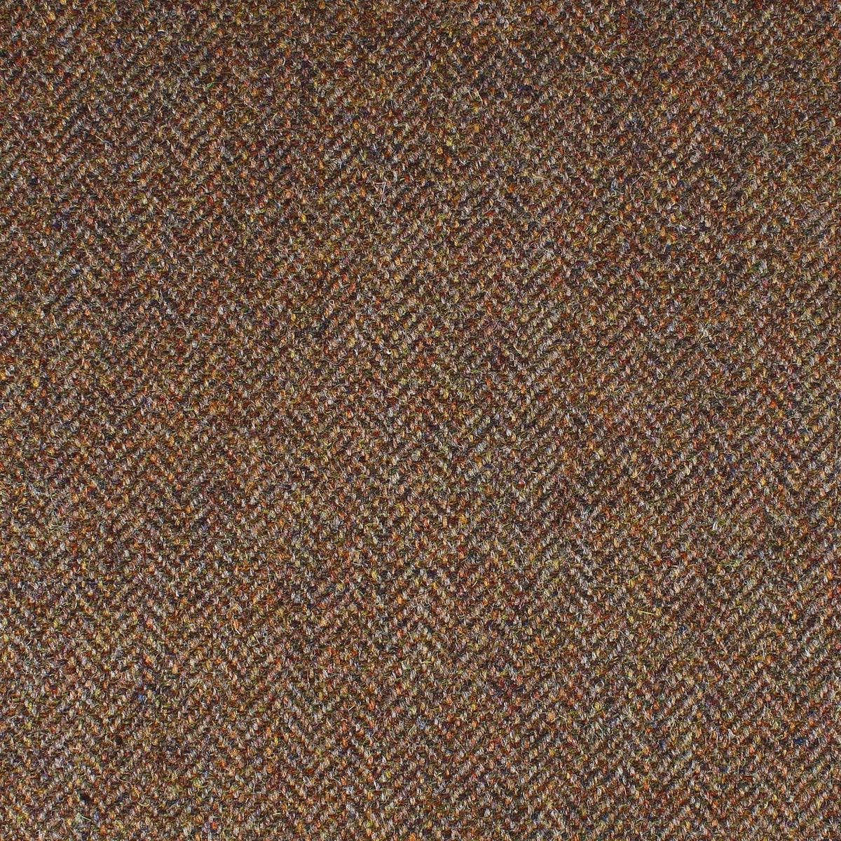 Field Tweed 105 brown herringbone Scottish tweed fabric with multi-colored flecks.
