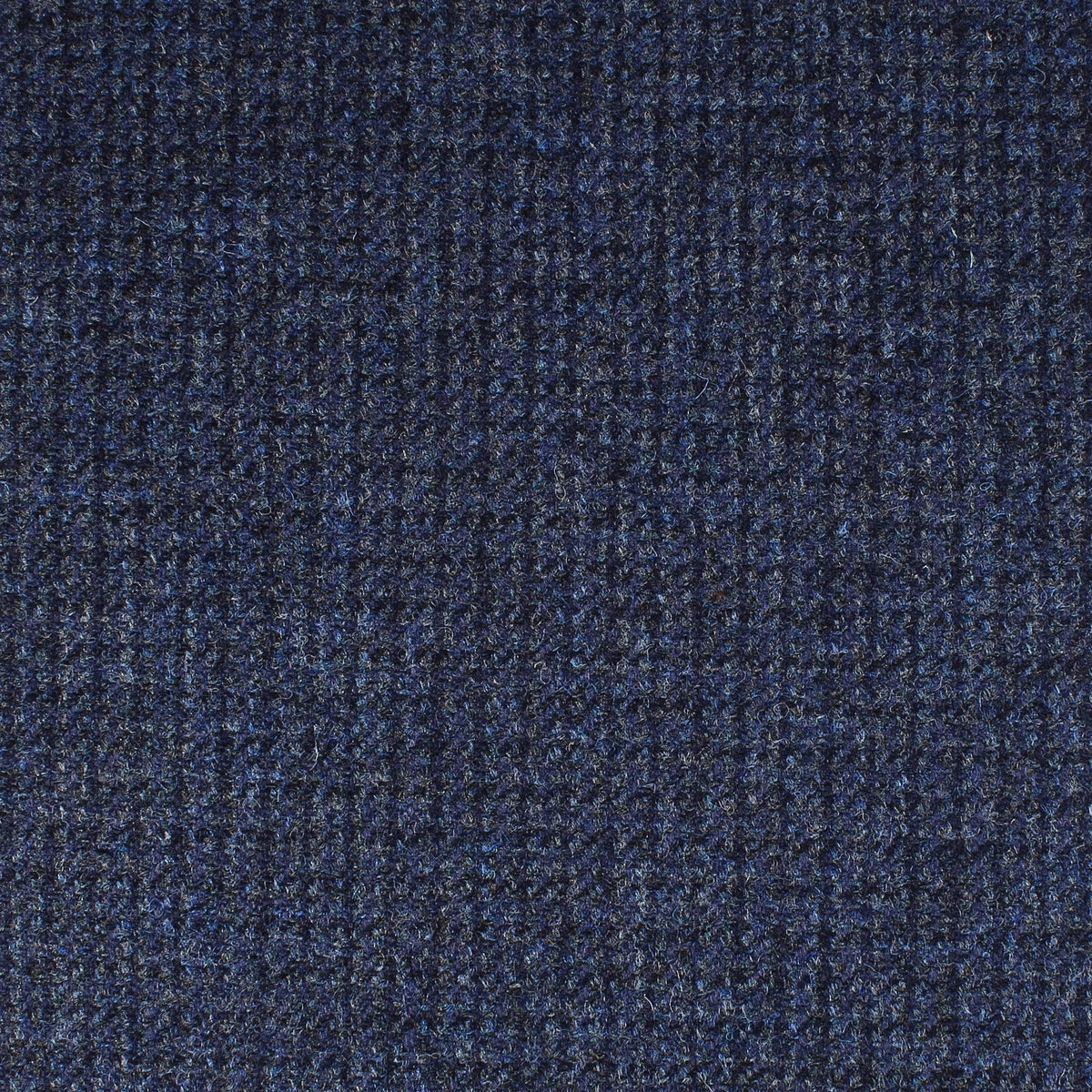 Field Tweed 116 dark navy blue Scottish tweed fabric with a subtle checkered pattern.