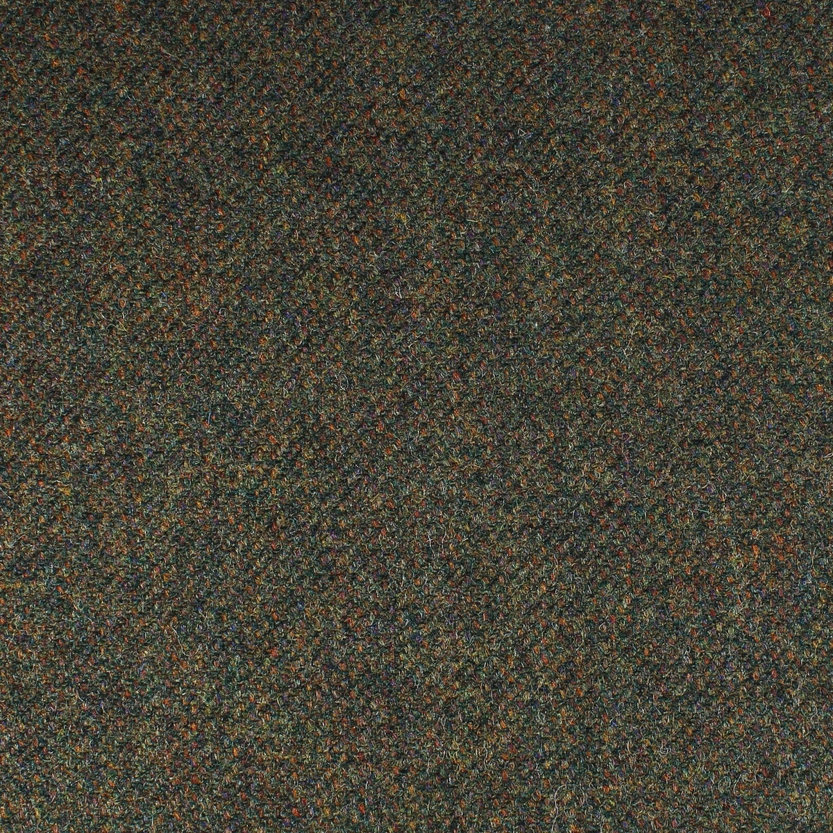 Dark green Field Tweed 146 Scottish tweed fabric with a multicolored speckled texture.