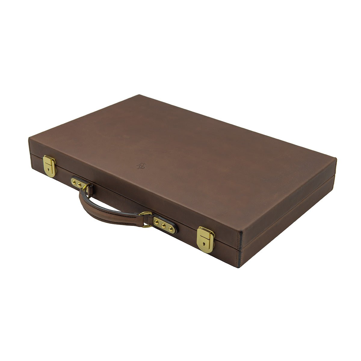 A closed Rey Pavón Leather Backgammon Set, featuring a brown leather exterior, handle, and gold-colored metal locks, is displayed against a white background.