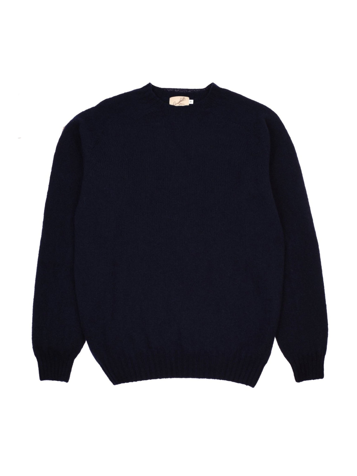 Navy blue Campbell’s of Beauly Shetland Jumper with a crew neck, long sleeves, and ribbed cuffs and hem.