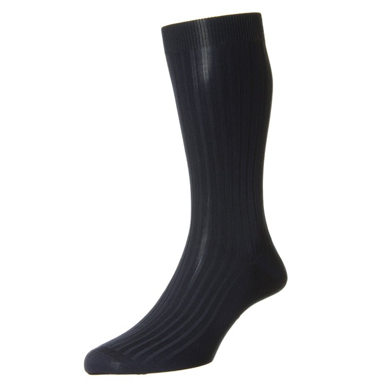 A single navy men’s Cotton Sock by Campbells of Beauly stands upright on a white background, featuring a ribbed texture and crafted from breathable cotton for everyday comfort.