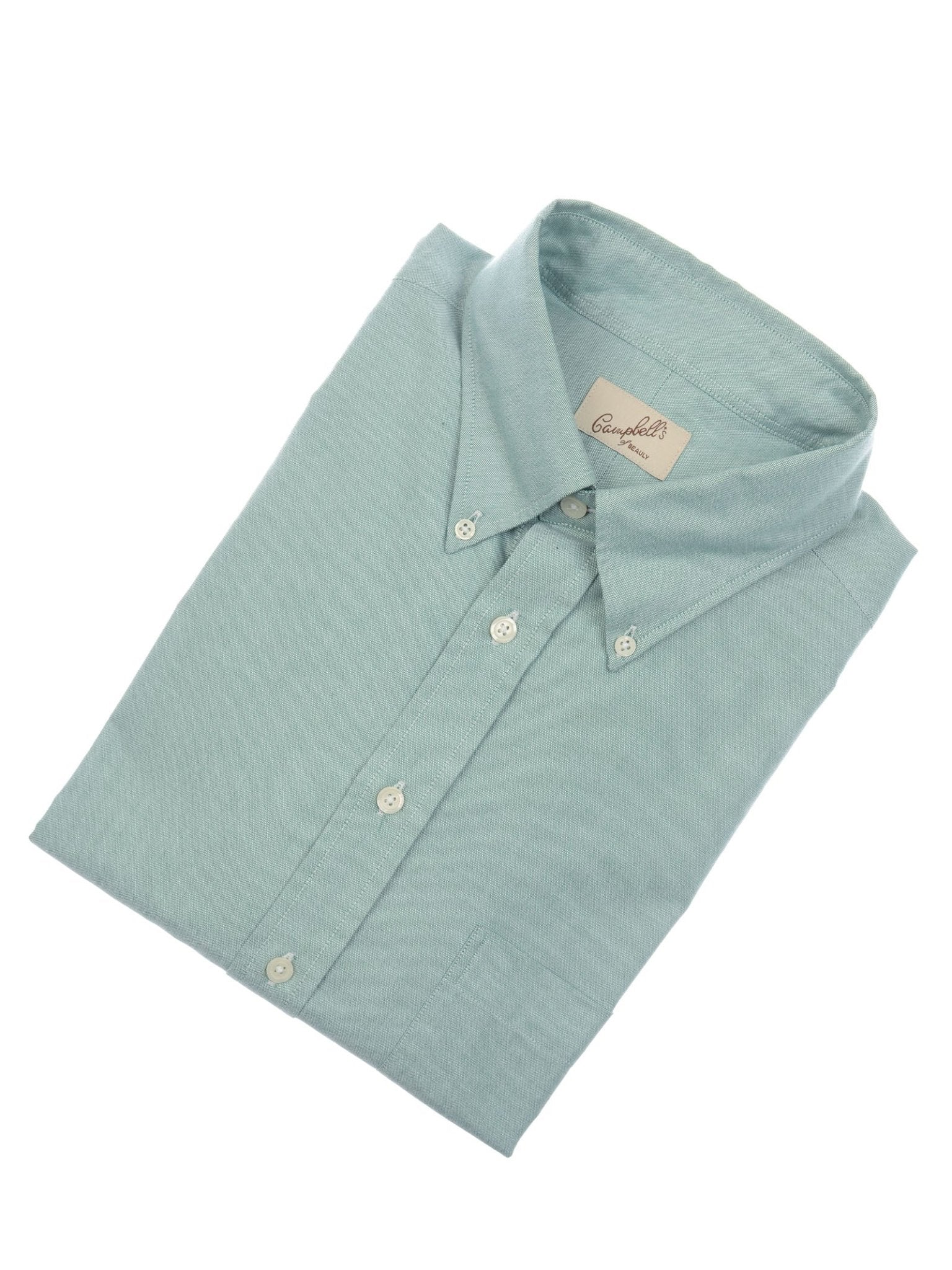 Campbell's of Beauly Oxford Button Down Shirt in light blue cotton, featuring a button-down collar, white buttons, and a visible front pocket, displayed neatly folded on a white background.