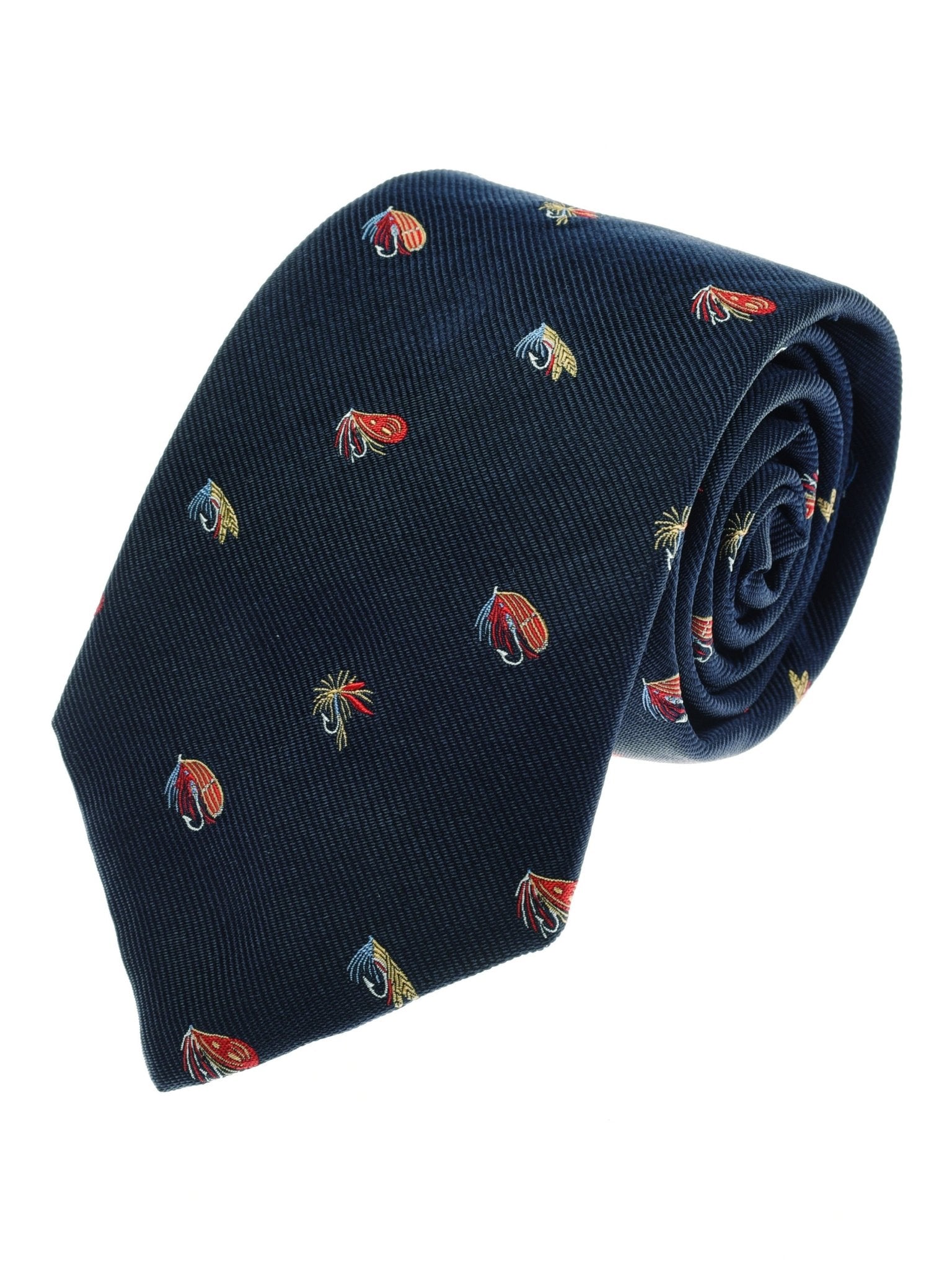 The Campbell’s of Beauly Fishing Fly Silk Tie is a rolled-up navy silk tie featuring a repeating pattern of small, embroidered red and yellow fishing flies.